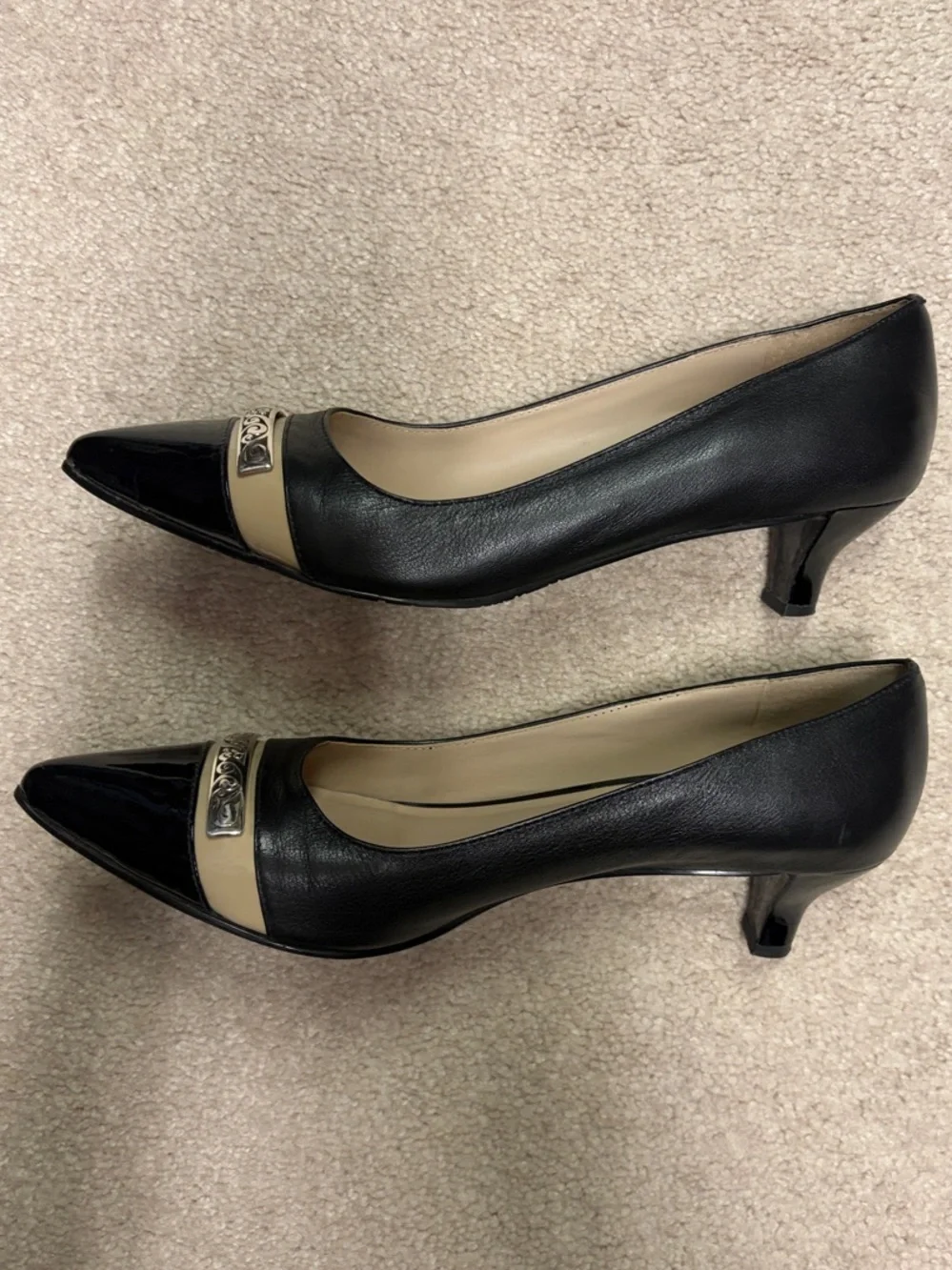 Brighton Black and Cream Pointed Toe Pumps with Decorative Metal Trim